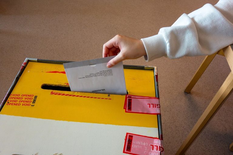 Postal Voting Reforms Aim to Widen Access Without Losing Trust A ballot being cast