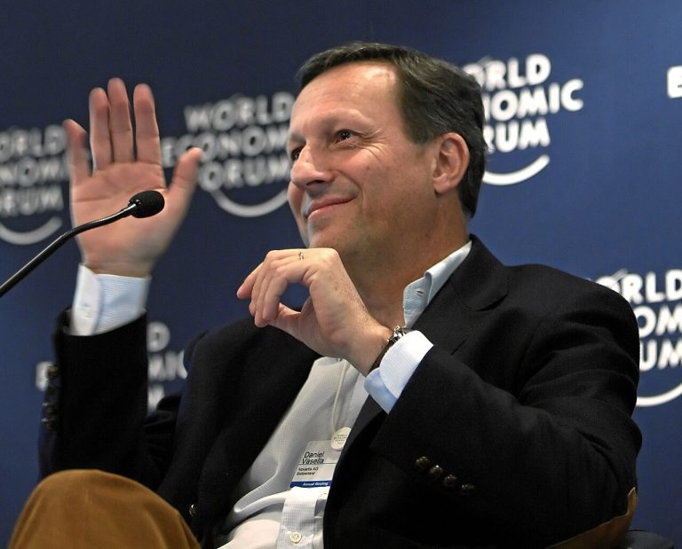Most CFOs Say Their AI Projects Have Yet to Show Measurable Results Business executive speaking at the World Economic Forum in Davos